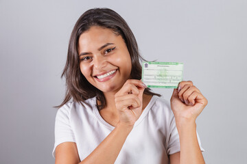 Brazilian woman, with voter registration, voting, elections.