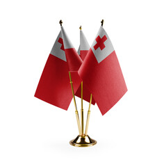 Small national flags of the Tonga on a white background