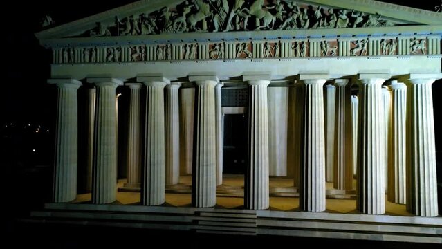 Aerial Backward Shot Of Illuminated Art Museum Against Clear Sky In City At Night - Nashville, Tennessee