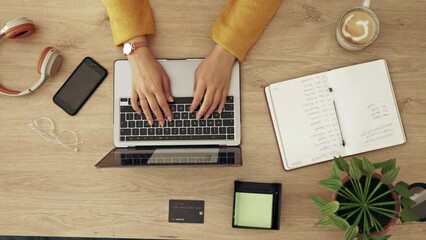 Above, workspace and hands typing on a laptop, planning work and responding to emails. Desk, online and a business person with a computer for a proposal, inspiration and research for a project