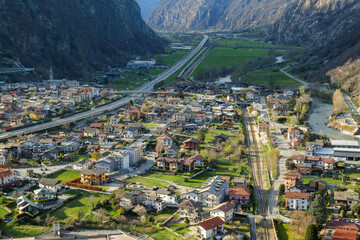 Bard, Italy. View from the Bard Fort of the valley where the Dora Baltea river flows. Town of Hone and Bard. On the left the motorway to Aosta and on the right the railway line. 2023-03-25.
