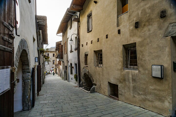 Bard, Italy. Ancient buildings in the historic center of the ancient village. View from Via Vittorio Emanuale II. 2023-03-25.