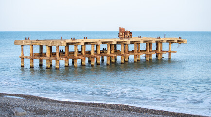 pier on the seashore, sea sky