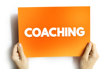 Coaching - form of development in which an experienced person supports a learner in achieving a specific personal or professional goal, text concept background