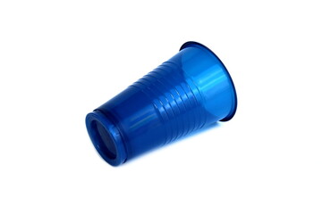 On a white background is a disposable plastic blue cup.