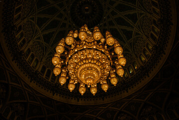 Bejeweled crystal and gold chandelier in the Sultan Qaboos Grand Mosque, Muscat, Oman