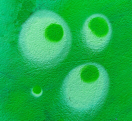 Colorful aerosol street wall background. Urban modern art texture. Wallpaper design backdrop pattern. Painted city wall close up.