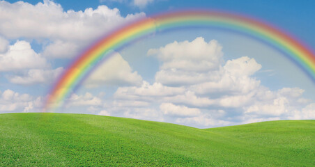 Beautiful outdoor lawn grass with synny day and rainbow