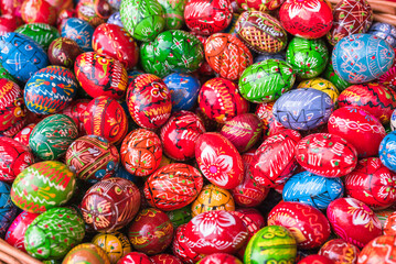 Fototapeta na wymiar Colorful decorated Easter eggs on street fair market