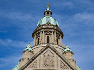 Photo of a spire with a natural frame of branches, blue sky in the background.
The Christuskirche in neo-Baroque style is a Protestant church in Mannheim's Oststadt district.