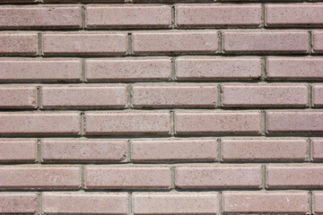 House wall element from a brown brick