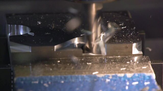 modern 5 axis drilling machine working on steel part