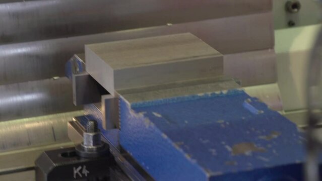 modern 5 axis drilling machine working on steel part