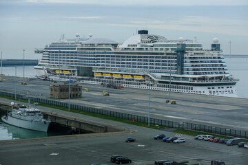 Modern mega white fun ship cruisehip cruise ship liner Prima or Bella sailing away departure from...