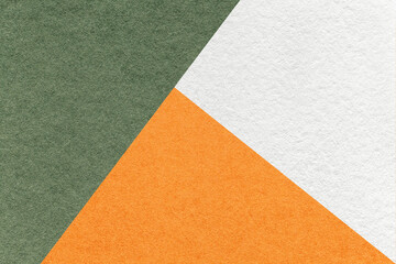 Texture of craft white, green and orange shade color paper background, macro. Vintage abstract...