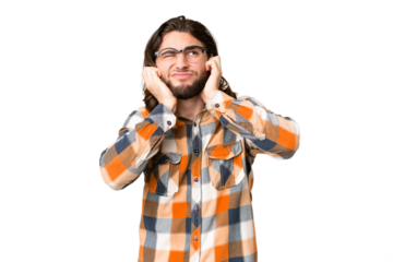 Young handsome man over isolated chroma key background frustrated and covering ears