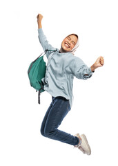 excited Muslim female university student jumping for joy with backpack in isolated background