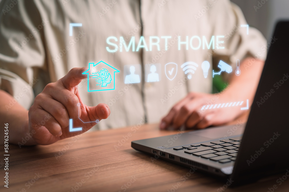 Aufkleber Iot smart home automation app concept. Adult man controlling technology AI smart home devices using a laptop computer with launched application in the bed room.
