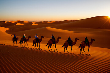 Fototapeta na wymiar camel caravan at sunrising in Sahara desert
