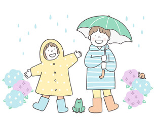 雨の日に傘をさす子供たちと紫陽花