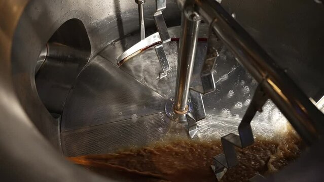 The process of mixing ingredients in a special tank