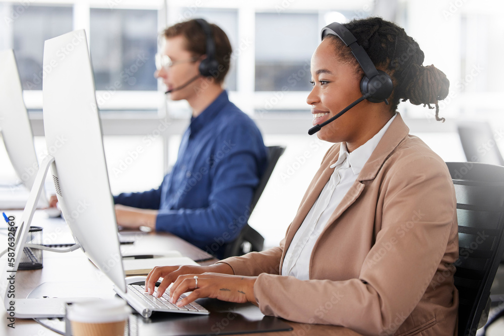 Wall mural Black woman, call center and typing on computer, smile in office and working on customer service in workplace. Telemarketing, desktop and happiness of person, female sales agent or consultant writing