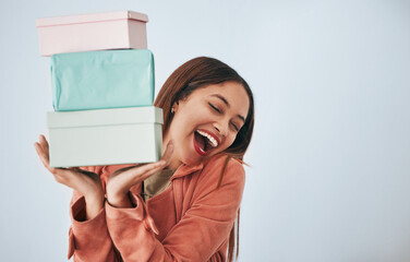 Gift box, excited and studio woman with shopping sales product, discount fashion deal or mall store...