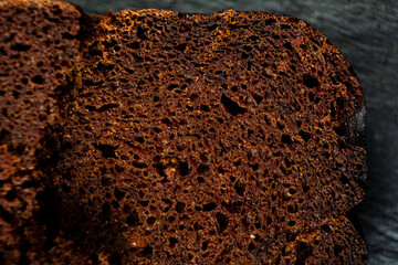 rye bread background on the dark
