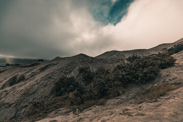 Fototapeta na wymiar Amazing desert volcanic landscape of Bromo and Batok volcanos, Java, Indonesia