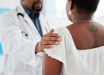 Doctor, hands and touch shoulder of patient for support, comfort and kindness. Healthcare, consultation and medical professional talking with black woman for empathy, bad news or cancer diagnosis.