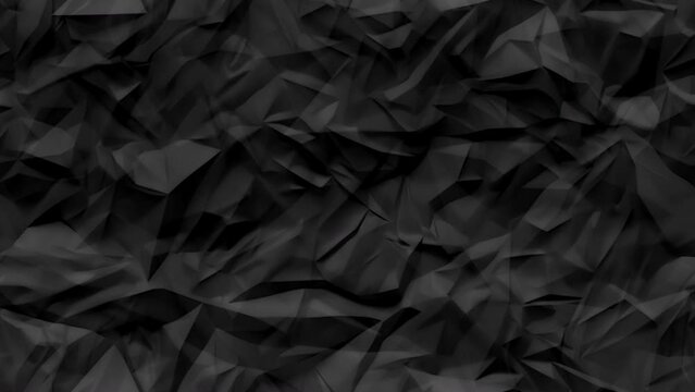 Stop motion of crumpled black texture background.