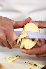 Remove cores of apples. Making Apple Tarte Tatin with Cinnamon Series.