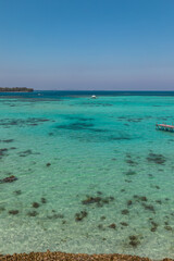Obraz premium Amazing turquoise lagoon with jetty on Karimunjava tropical island, Indonesia