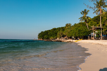 Tropical landscape of Indonesian island Karimunjava with jungle and turquoise lagoon in the distance. 