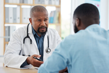 Doctor, serious black man and patient consultation in hospital for talking, checkup or results. Healthcare, medical professional and African person consulting physician for advice or cancer diagnosis - obrazy, fototapety, plakaty