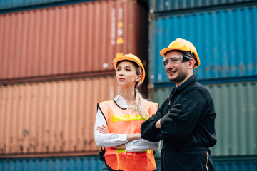 Teamwork and team spirit worker together corporate trust concept. happy looking at camera and show thumbs up in factory container