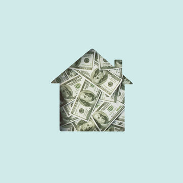 House cut out, filled with money; Wealth, business, money, pension, profit minimal concept;