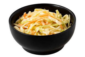 Coleslaw in a black ceramic bowl isolated.
