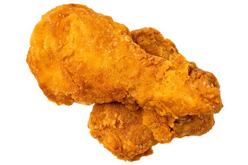 Crispy fried chicken pieces, drumstick and thigh, isolated from above.