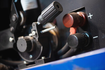 Fototapeta na wymiar Pressure roller of the semi automatic welding machine close up.