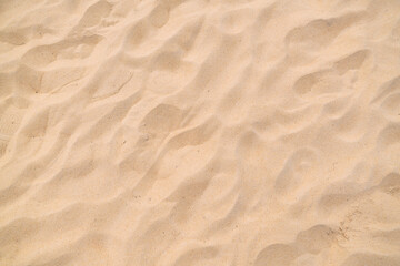 Close up Nature Beach Sand Soft Texture In Summer Sun.