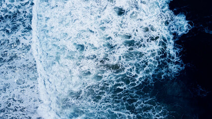 Amazing Blue ocean wave Top-down Aerial view shot. Professional footage - obrazy, fototapety, plakaty