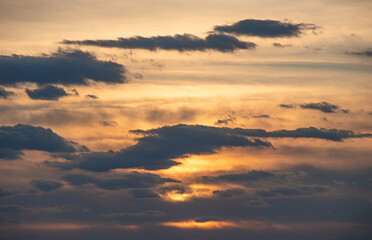 Natural background - clouds in the sky at sunset close up, cloudscape