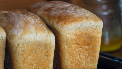 Freshly baked bread. Yellow homemade bread. Square bread. Homemade baking