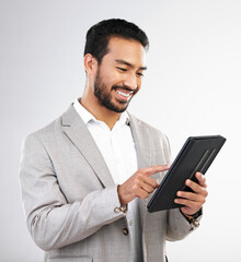 Smile, business and Asian man with tablet, typing and connection isolated on a white studio background. Japanese male ceo, employee and entrepreneur with device, scroll and network for online reading