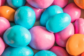 Candy sea pebbles background. Sweet candy sea pebbles close up.