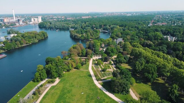 Aerial drone view of boats in the Spree River near Insel der Jugend and Treptower Park Berlin