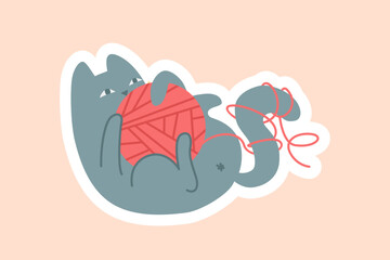 Grey cat with ball sticker. Cute and adorable pet played and paws around tangle. Charming little furry kitten. Design element for greeting postcards. Cartoon flat vector illustration