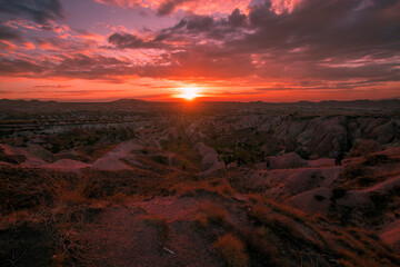Fototapeta na wymiar Wonderful sunset view in the red valley in Cappadocia