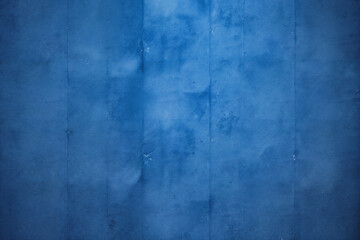 Fototapeta na wymiar Damaged blue cement wall background